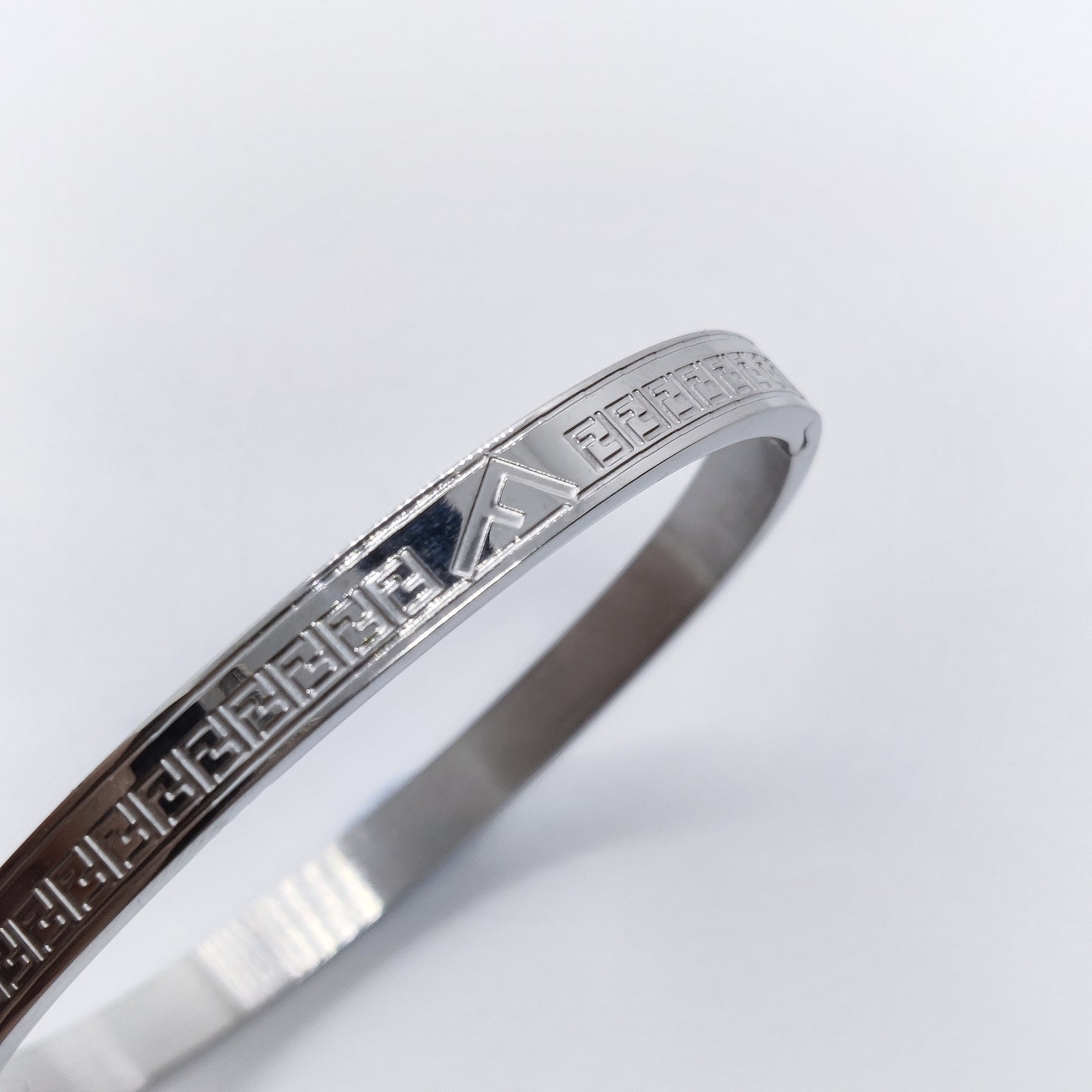 "From Fahm" Silver Titanium F Bangle