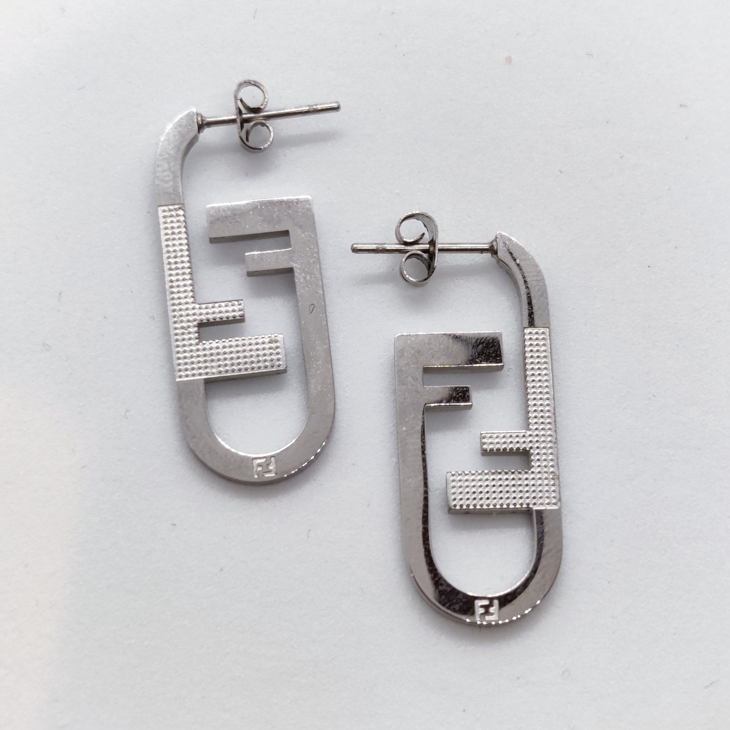 "From Fahm" Silver Titanium Hoop Earrings